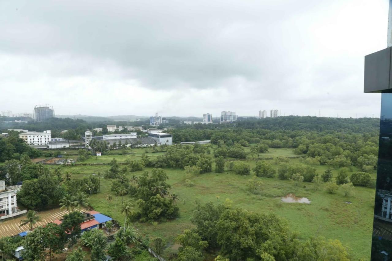 Traven Homes Infopark Kakkanad Corporate Suit Rooms Kochi Exterior photo