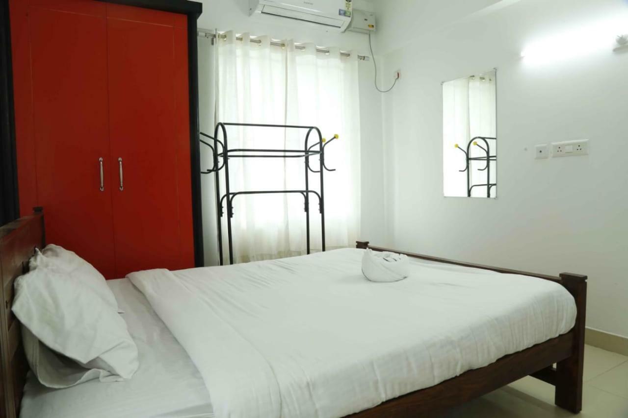 Traven Homes Infopark Kakkanad Corporate Suit Rooms Kochi Exterior photo