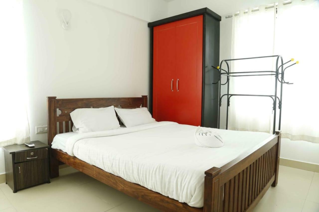 Traven Homes Infopark Kakkanad Corporate Suit Rooms Kochi Exterior photo