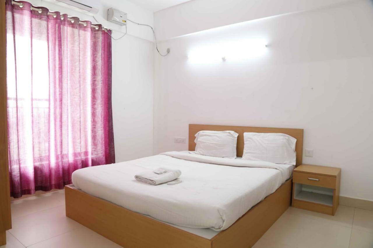 Traven Homes Infopark Kakkanad Corporate Suit Rooms Kochi Exterior photo